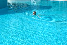 Young Woman In The Swimming Pool Stock Photo