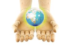 A World On Wooden Hand Royalty Free Stock Photo A World On Wooden Hand Royalty Free Stock Photo