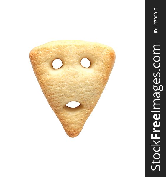 One triangle biscuit like a human face isolated on white background. Clipping path is included. One triangle biscuit like a human face isolated on white background. Clipping path is included