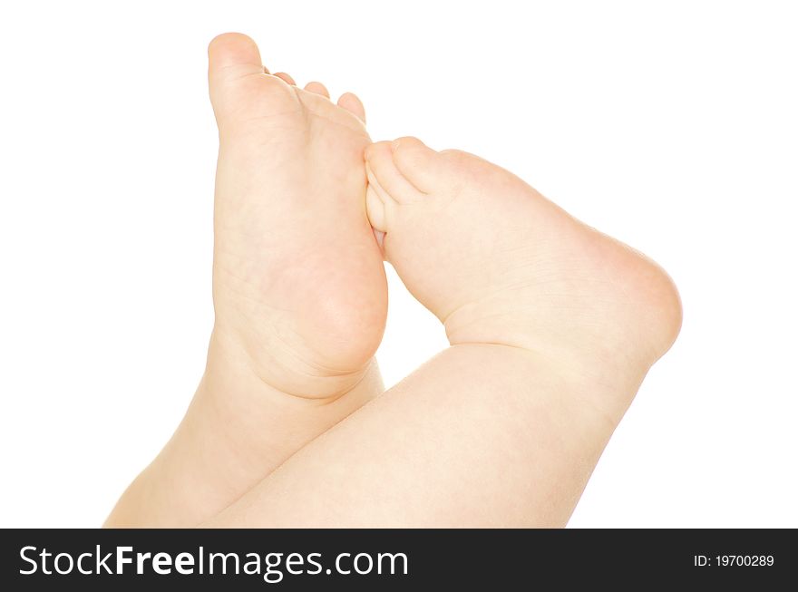 Newborn baby feet and hands isolated on white