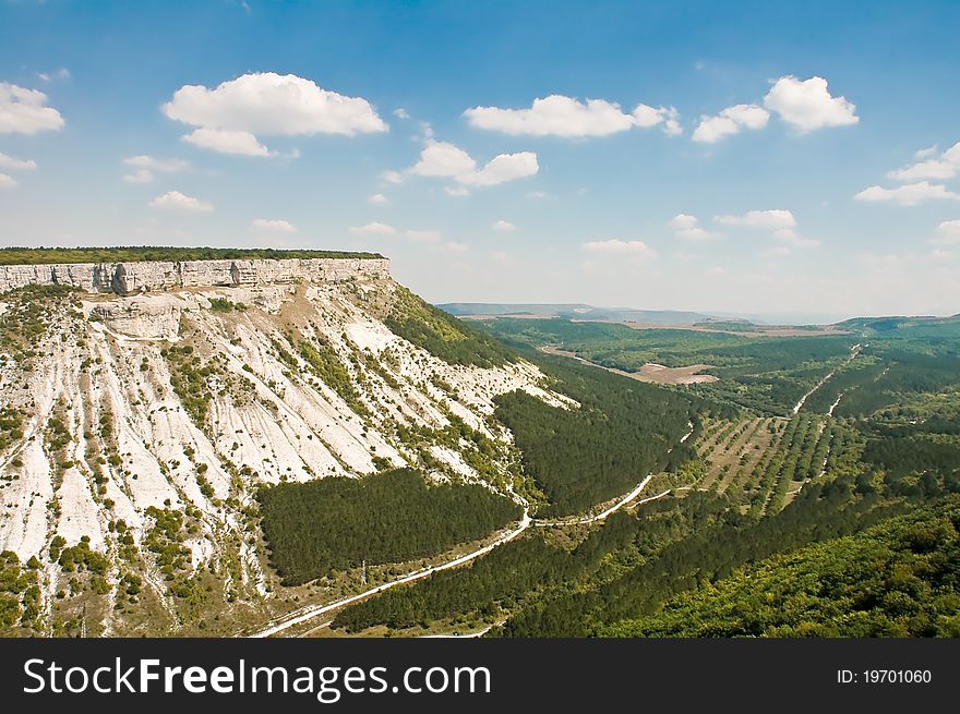 Beautiful landscape in Crimea mountain plateau and the valley with a road