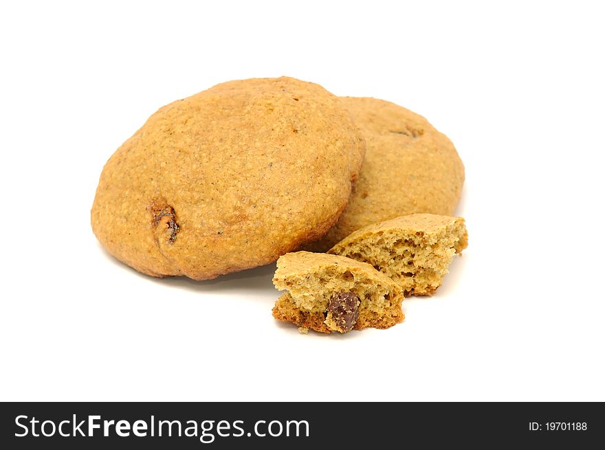 Oatmeal cookies with raisins and crumbs isolated on a white background