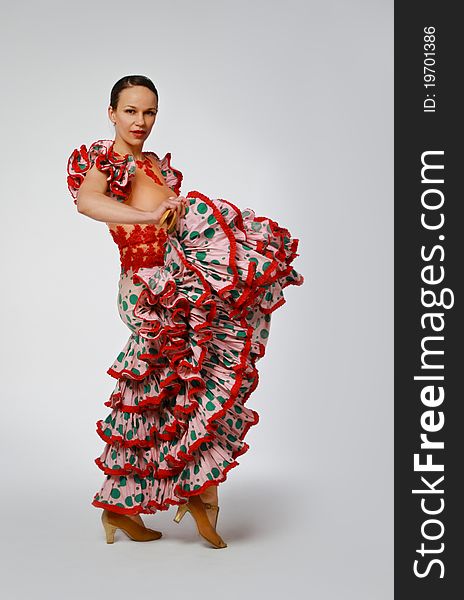 Young Woman Dancing Flamenco With Castanets