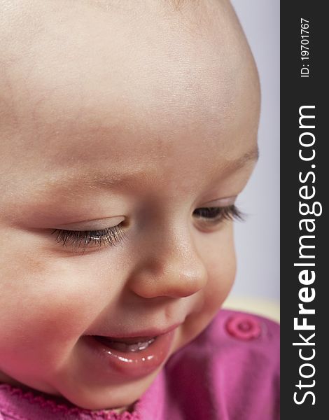 Closeup portrait of smiling baby girl. Closeup portrait of smiling baby girl