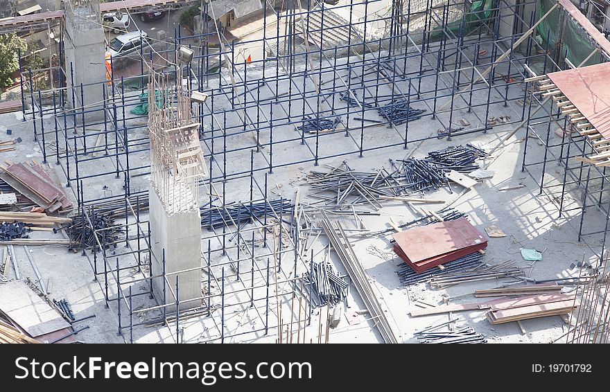 Scaffolding, and building materials at a site in Mumbai, India. Scaffolding, and building materials at a site in Mumbai, India