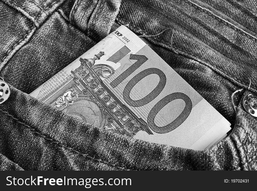 One hundred euros in jeans pocket background