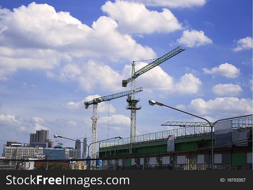 Construction Crane Against The Blue Sky