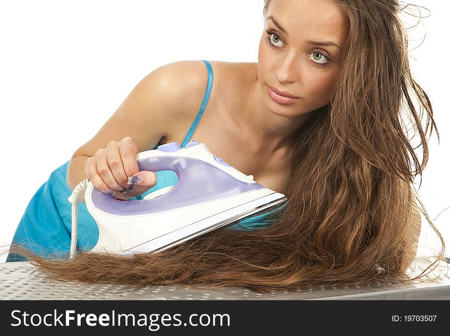 Woman Ironing Her Hair