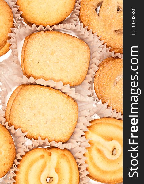 Background of an assortment of Danish cookies.