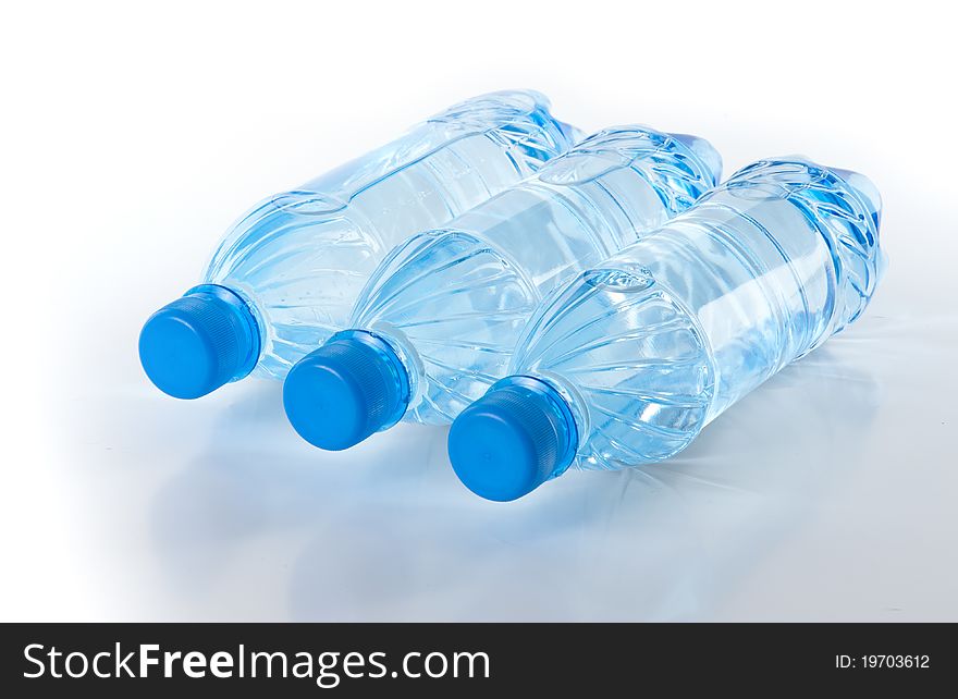 Bottle of water isolated on the white. Bottle of water isolated on the white