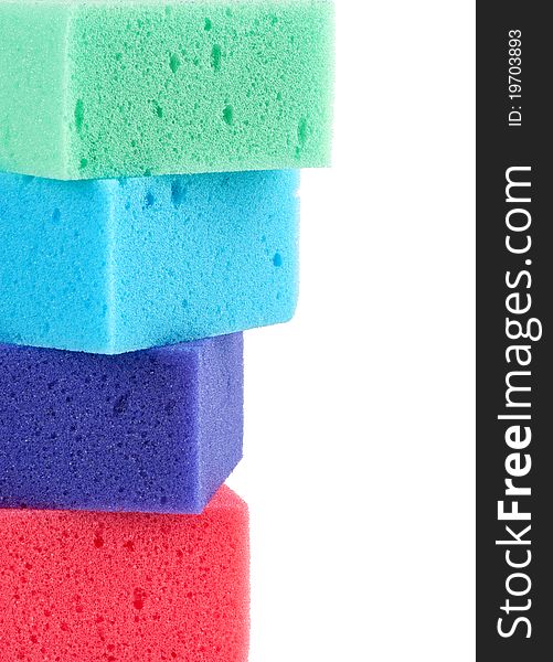 Colored sponges on a white background