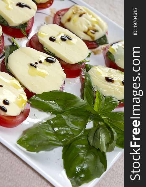 Tomatos, Cheese And Basil With Olive Oil.