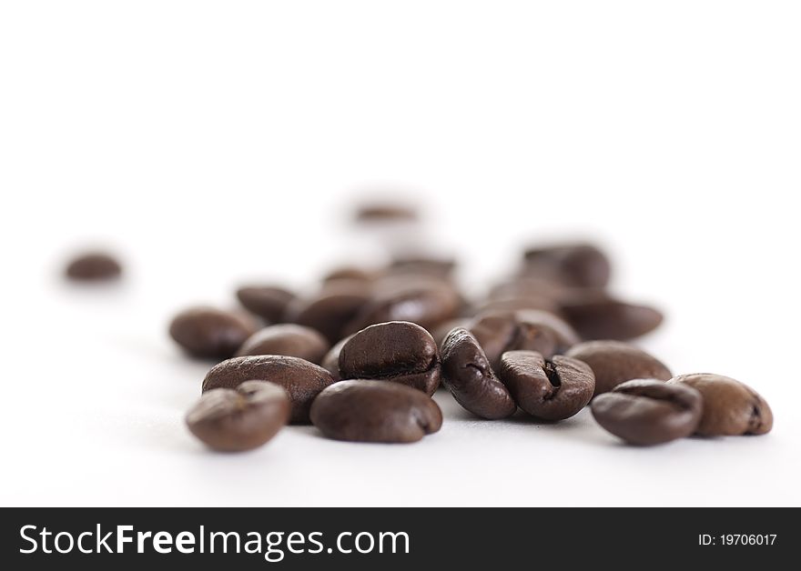 Coffe beans on white background. Coffe beans on white background