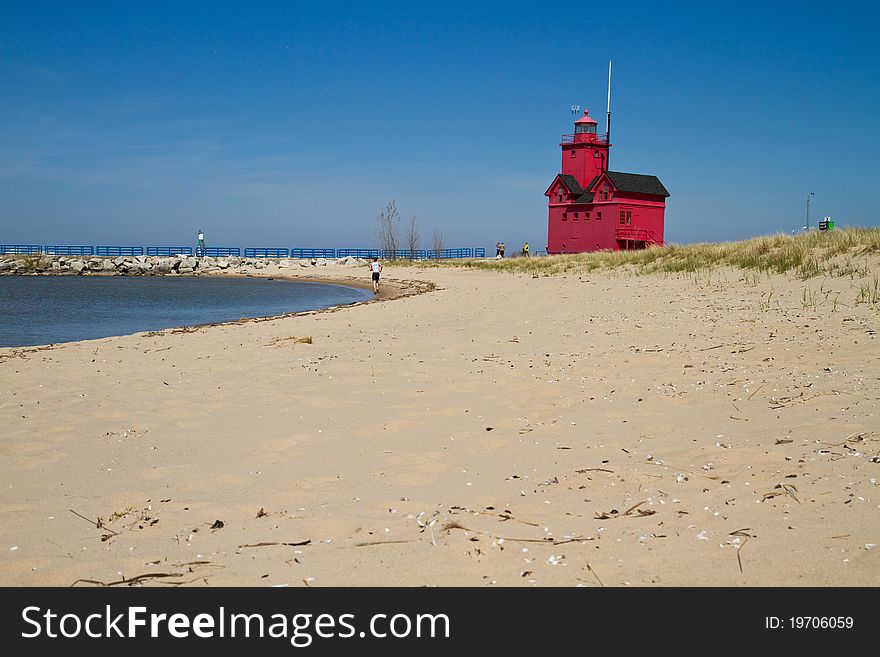 Red lighthouse on the coast of Lake Michigan. Red lighthouse on the coast of Lake Michigan
