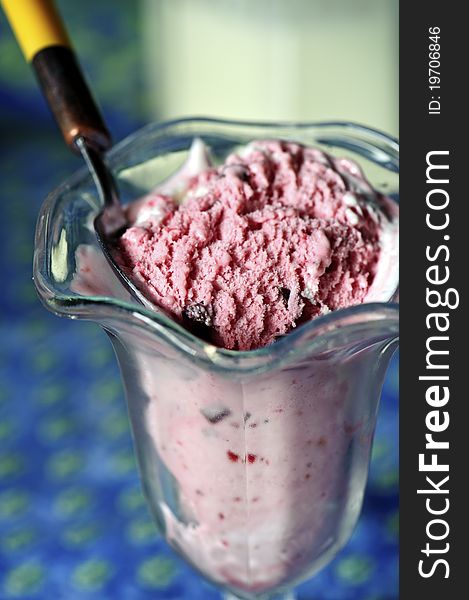 Close-up of strawberry ice-cream in a glass