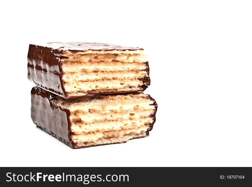 Two pieces delicious chocolate bar isolated on a white background