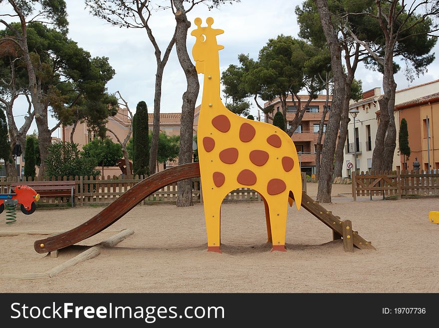 Giraffe in a playground in Girona. Giraffe in a playground in Girona