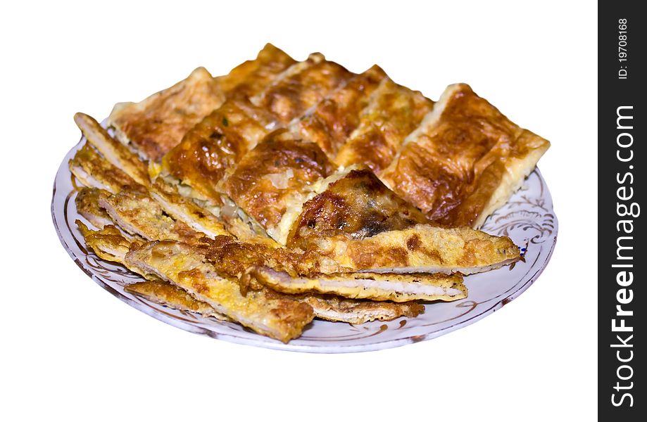 Tasty Pie on a plate isolated on a white background