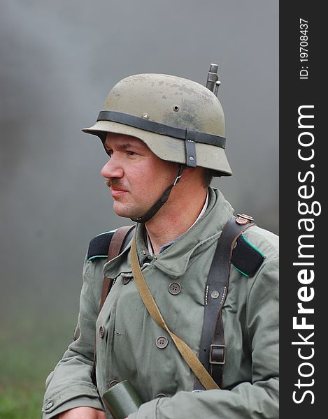 Member of Red Star history club wears historical German uniform during historical reenactment of WWII in Kiev,Ukraine. Member of Red Star history club wears historical German uniform during historical reenactment of WWII in Kiev,Ukraine