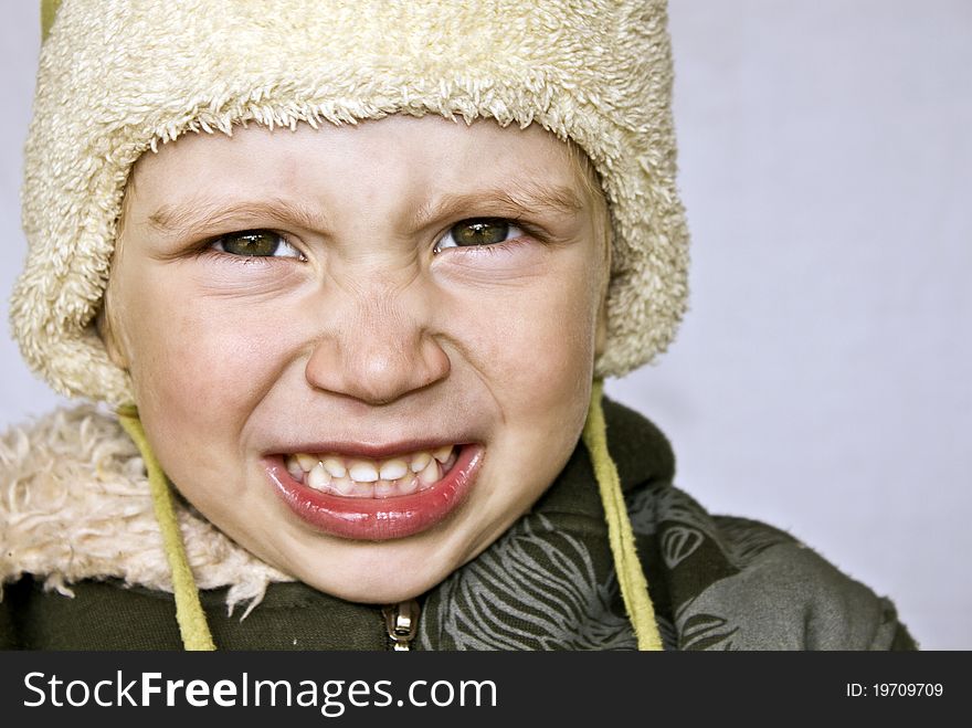 A shot of Cute expressive little boy. A shot of Cute expressive little boy