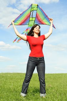 Girl Standing On Summer Meadow With Kite Stock Image