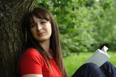 Girl Siting Near Tree And Reading Book Stock Image Girl Siting Near Tree And Reading Book Stock Image