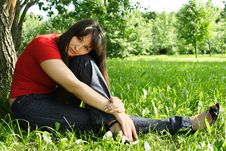 Girl In Red Shirt Siting Near Tree Stock Photo Girl In Red Shirt Siting Near Tree Stock Photo