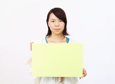 Portrait Of Young Woman Holding Blank Board Royalty Free Stock Photography Portrait Of Young Woman Holding Blank Board Royalty Free Stock Photography