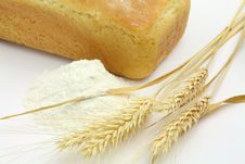 White Bread And Spikes Of Wheat And Wheat Flour Royalty Free Stock Photography White Bread And Spikes Of Wheat And Wheat Flour Royalty Free Stock Photography