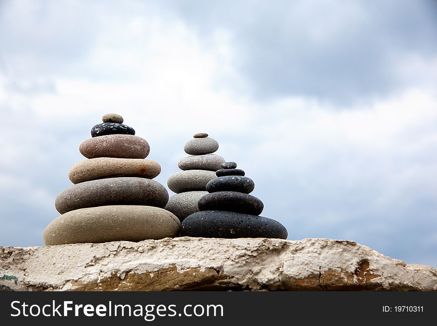 Pebble. Balanced stones on the beach