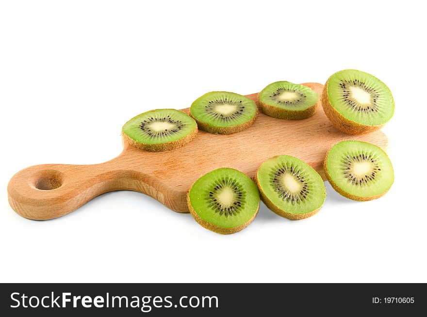 Slices of kiwi on the cutting board