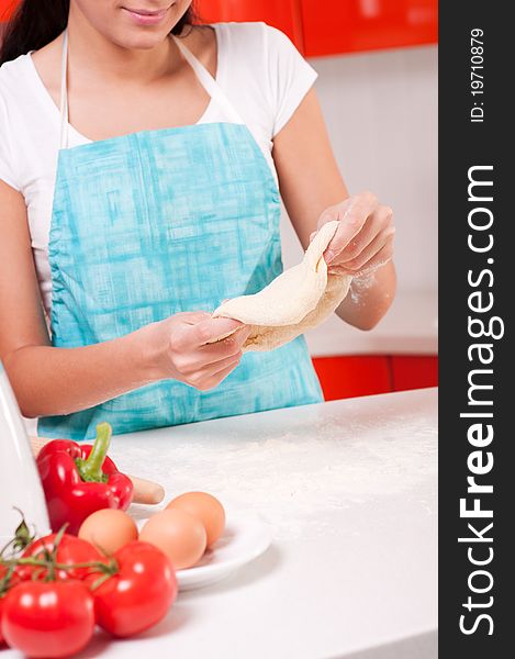 Woman Hands Mixing Dough On The Table