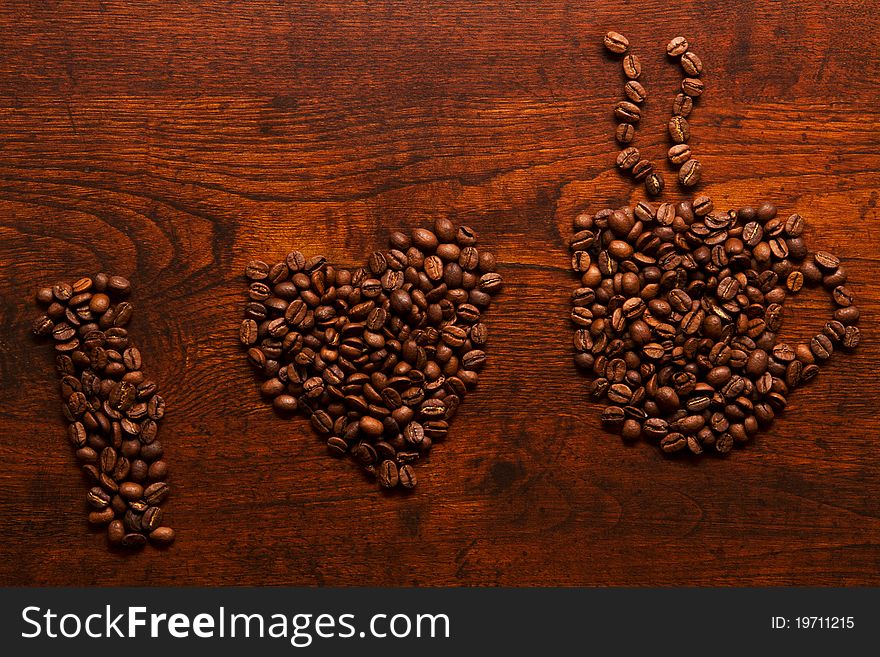 I love coffee inscription on the wooden table background