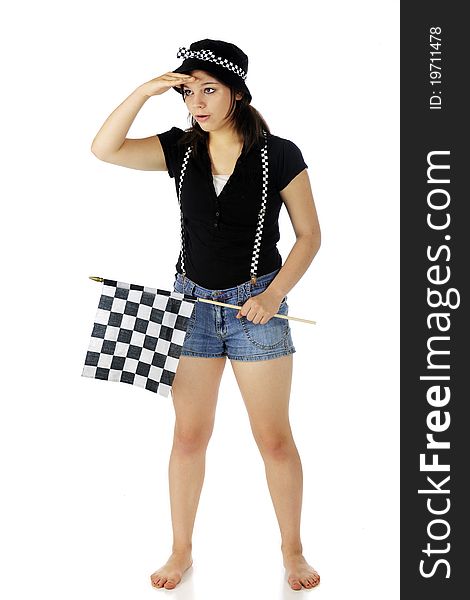 An attractive teen racing fan scanning the scene while holding a racing flag and wearing its black and white checks. Isolated on white. An attractive teen racing fan scanning the scene while holding a racing flag and wearing its black and white checks. Isolated on white.