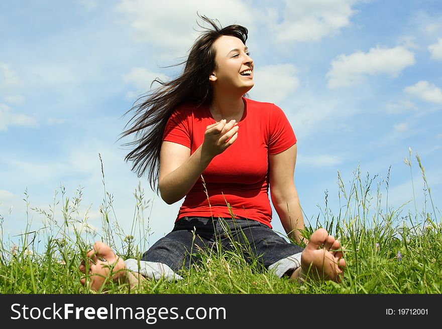 Barefooted Women Siting On Summer Meadow