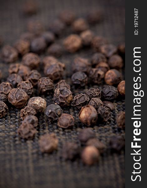 Black pepper on dark backround