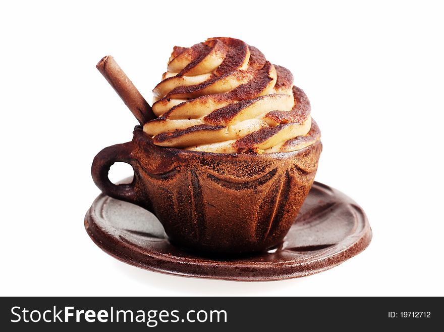 Coffee cream in decorative chocolate cup. Coffee cream in decorative chocolate cup