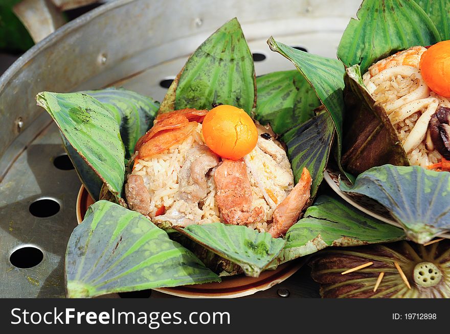 Image of thai food, rice in lotus leaves