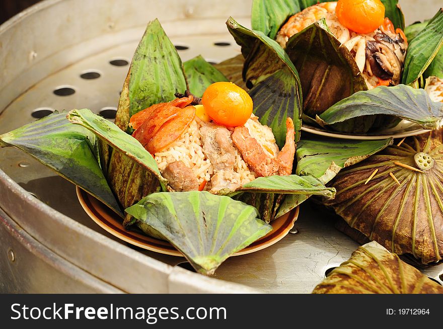 Image of thai food, rice in lotus leaves