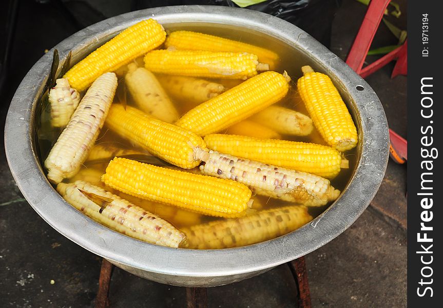 Image of steamed corn in basin