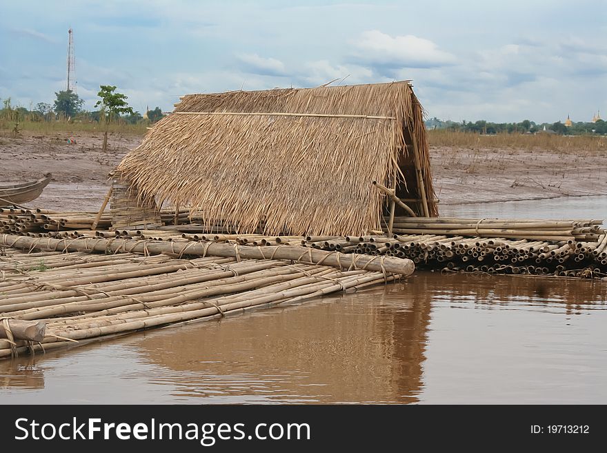 Thatched hut in Myanmar in marsh.