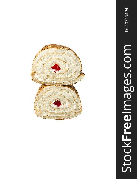 One slice of swiss roll standing on an other. One slice of swiss roll standing on an other