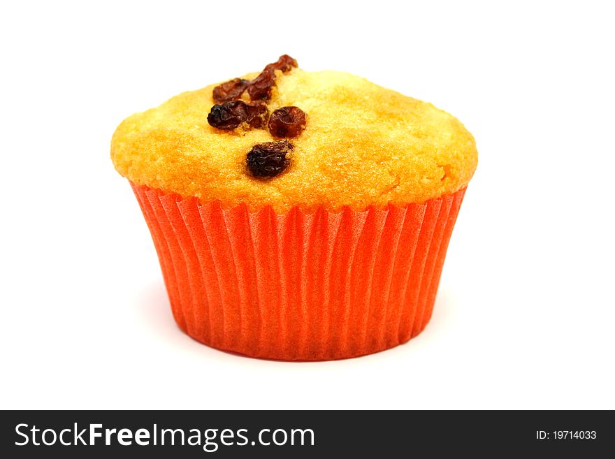 Tasty Yellow Muffin With Many Brown Raisins