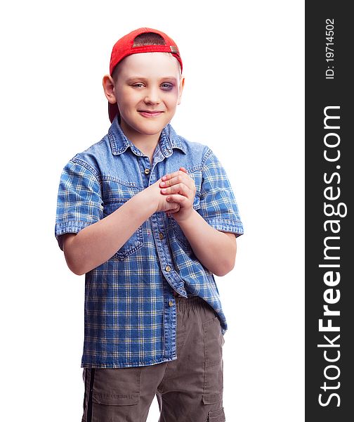 Naughty boy with a bruise under his eye, isolated against white background