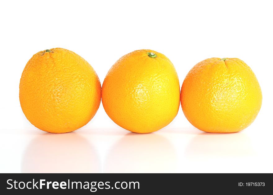 Tree oranges isolated on white