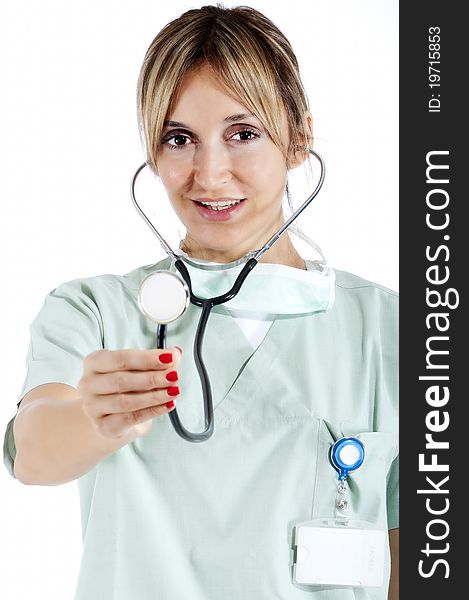 Smiling confident medical staff pointing with a stetoscope. Smiling confident medical staff pointing with a stetoscope