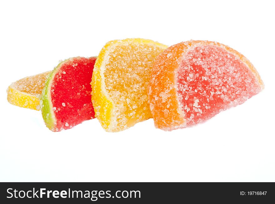 Slices of fruit jelly in sugar. Isolated