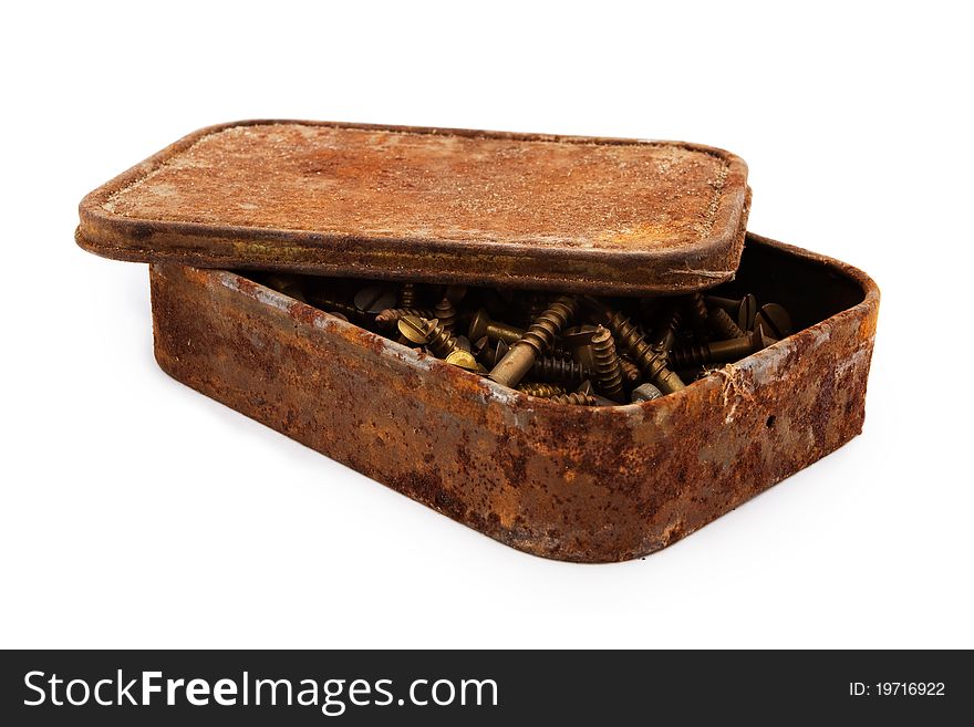 Rusty aged tin of screws isolated on a white background. Rusty aged tin of screws isolated on a white background