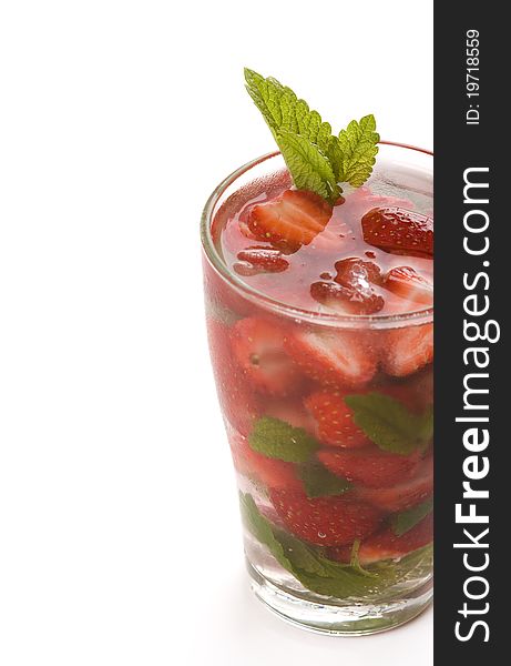 Strawberries mojito with mint leaves isolated over white. Strawberries mojito with mint leaves isolated over white