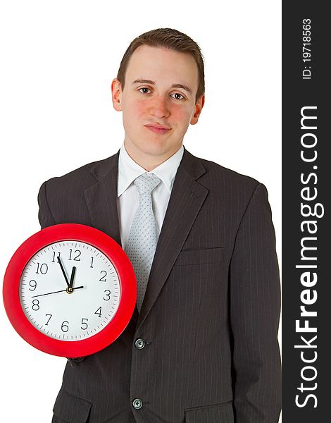 Young businessman, stressed holding a clock. Young businessman, stressed holding a clock.